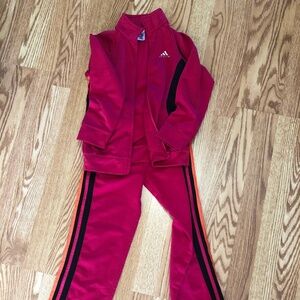 Red jump suit -adidas